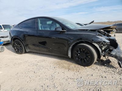 Czwarte zdjęcie samochodu z boku: 2023 TESLA MODEL Y VIN:7SAYGDEE9PF828055 - miniatura