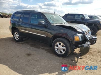 Czwarte zdjęcie samochodu z boku: 2008 GMC ENVOY VIN:1GKDT13S182190004 - miniatura