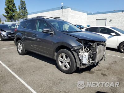 Czwarte zdjęcie samochodu z boku: 2014 TOYOTA RAV4 XLE VIN:JTMWFREV8ED027335 - miniatura