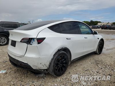 Trzecie zdjęcie samochodu z tyłu: 2024 TESLA MODEL Y VIN:7SAYGDED6RF098213 - miniatura