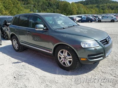 Czwarte zdjęcie samochodu z boku: 2004 VOLKSWAGEN TOUAREG 4.2 VIN:WVGEM77L84D046978 - miniatura