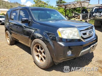 Czwarte zdjęcie samochodu z boku: 2011 HONDA PILOT EXLN VIN:5FNYF4H72BB101605 - miniatura