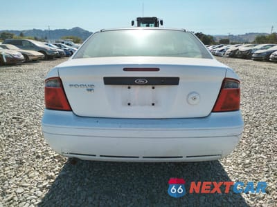 Zdjęcie 6 z 12 samochodu: 2007 FORD FOCUS ZX4 VIN:1FAHP34N07W232889 - miniatura