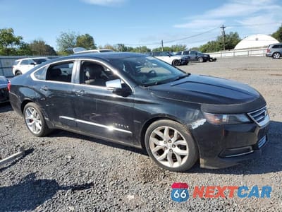Czwarte zdjęcie samochodu z boku: 2014 CHEVROLET IMPALA LTZ VIN:2G1155S30E9100793 - miniatura