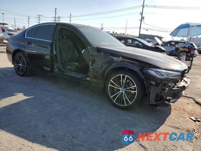 Czwarte zdjęcie samochodu z boku: 2022 BMW 530E VIN:WBA13AG00NCJ60437 - miniatura