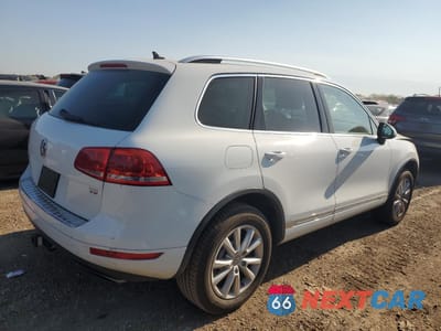 Trzecie zdjęcie samochodu z tyłu: 2014 VOLKSWAGEN TOUAREG V6 VIN:WVGEF9BP8ED013738 - miniatura