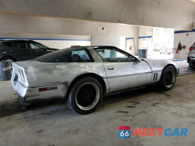 Trzecie zdjęcie samochodu z tyłu: 1990 CHEVROLET CORVETTE VIN:1G1YY2388L5105569 - miniatura