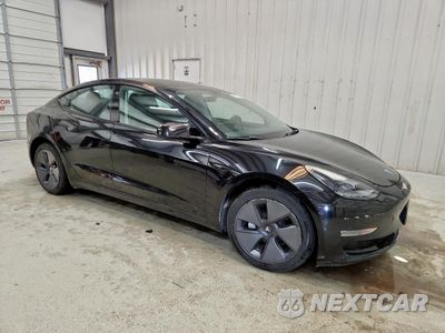 Czwarte zdjęcie samochodu z boku: 2023 TESLA MODEL 3 VIN:5YJ3E1EA1PF436258 - miniatura