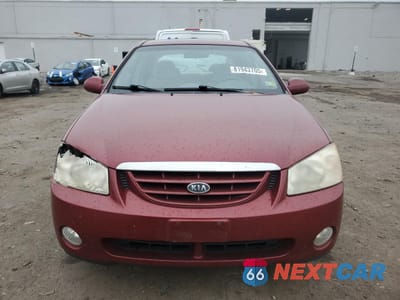 Piąte zdjęcie samochodu w środku: 2005 KIA SPECTRA LX VIN:KNAFE121555134114 - miniatura
