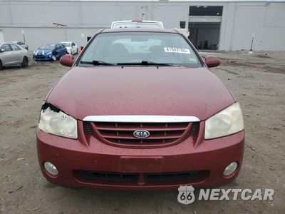 Piąte zdjęcie samochodu w środku: 2005 KIA SPECTRA LX VIN:KNAFE121555134114 - miniatura