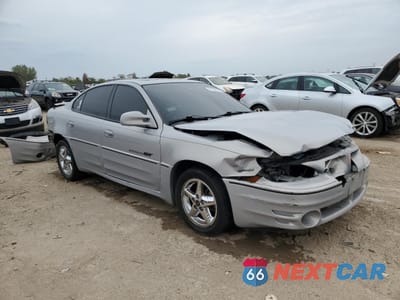 Czwarte zdjęcie samochodu z boku: 2000 PONTIAC GRAND AM GT VIN:1G2NW52E5YC550660 - miniatura