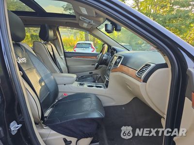 Piąte zdjęcie samochodu w środku: 2011 JEEP GRAND CHEROKEE OVERLAND VIN:1J4RR6GT1BC605396 - miniatura