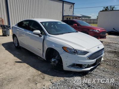 Czwarte zdjęcie samochodu z boku: 2018 FORD FUSION SE HYBRID VIN:3FA6P0LU1JR109286 - miniatura