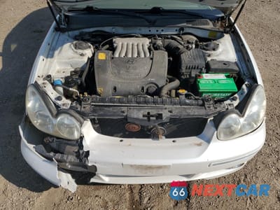 Zdjęcie 11 z 12 samochodu: 2002 HYUNDAI SONATA GLS VIN:KMHWF35H12A689693 - miniatura
