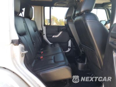 Zdjęcie 11 z 15 samochodu: 2013 JEEP WRANGLER UNLIMITED SAHARA VIN:1C4BJWEG4DL537747 - miniatura