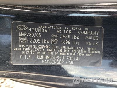 Zdjęcie 12 z 14 samochodu: 2005 HYUNDAI TIBURON VIN:KMHHM65D65U178514 - miniatura