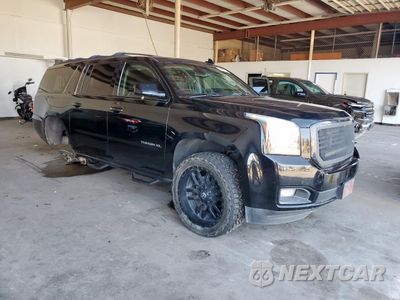 Czwarte zdjęcie samochodu z boku: 2019 GMC YUKON XL K1500 SLT VIN:1GKS2GKC1KR120900 - miniatura