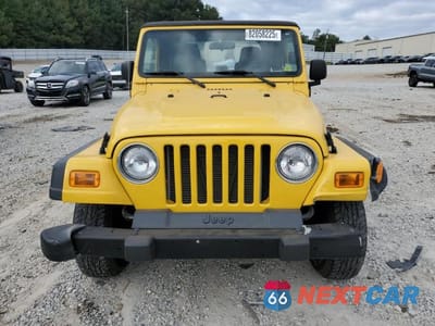 Piąte zdjęcie samochodu w środku: 2004 JEEP WRANGLER X VIN:1J4FA39SX4P746458 - miniatura