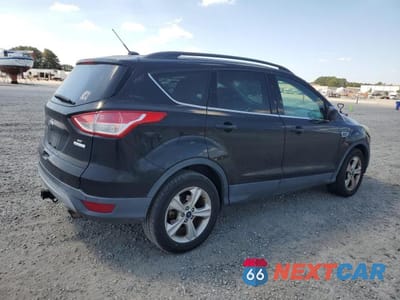 Trzecie zdjęcie samochodu z tyłu: 2016 FORD ESCAPE SE VIN:1FMCU0G93GUC19975 - miniatura