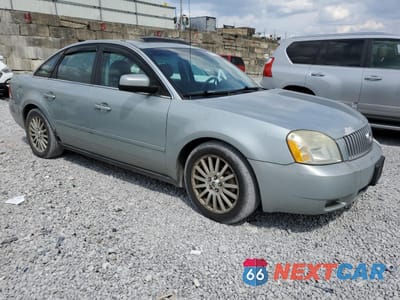 Czwarte zdjęcie samochodu z boku: 2006 MERCURY MONTEGO PREMIER VIN:1MEHM421X6G607476 - miniatura