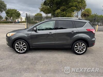 Zdjęcie 12 z 15 samochodu: 2016 FORD ESCAPE SE VIN:1FMCU0GX4GUC35892 - miniatura
