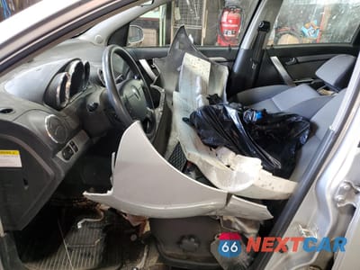 Zdjęcie 7 z 13 samochodu: 2009 PONTIAC G3 VIN:KL2TD66E59B634061 - miniatura