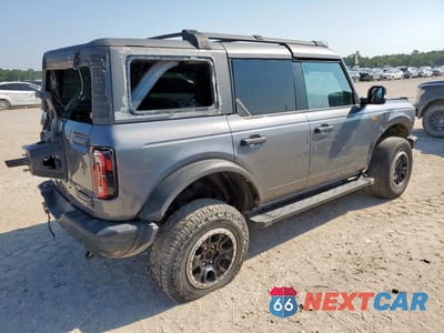 Trzecie zdjęcie samochodu z tyłu: 2023 FORD BRONCO BASE VIN:1FMEE5DH1PLB80999 - miniatura