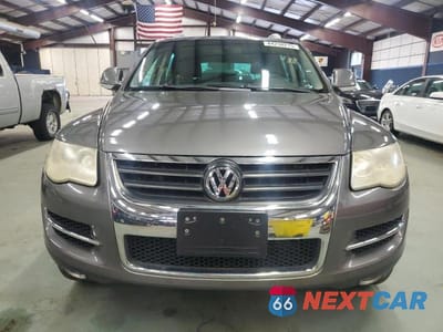 Piąte zdjęcie samochodu w środku: 2009 VOLKSWAGEN TOUAREG 2 V6 VIN:WVGBE77L19D012372 - miniatura