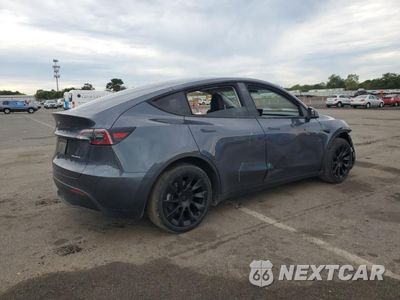 Trzecie zdjęcie samochodu z tyłu: 2023 TESLA MODEL Y VIN:7SAYGDEE6PF693505 - miniatura