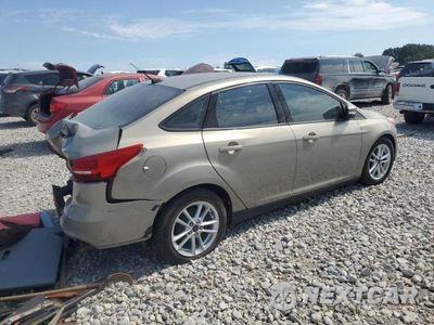 Trzecie zdjęcie samochodu z tyłu: 2016 FORD FOCUS SE VIN:1FADP3F2XGL401819 - miniatura