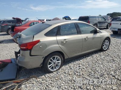Trzecie zdjęcie samochodu z tyłu: 2016 FORD FOCUS SE VIN:1FADP3F2XGL401819 - miniatura