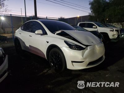Czwarte zdjęcie samochodu z boku: 2023 TESLA MODEL Y VIN:7SAYGDEE9PF688489 - miniatura