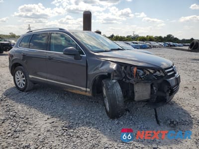 Czwarte zdjęcie samochodu z boku: 2012 VOLKSWAGEN TOUAREG V6 TDI VIN:WVGFK9BP8CD005071 - miniatura