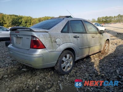 Trzecie zdjęcie samochodu z tyłu: 2006 FORD FOCUS ZX4 VIN:1FAHP34NX6W195171 - miniatura