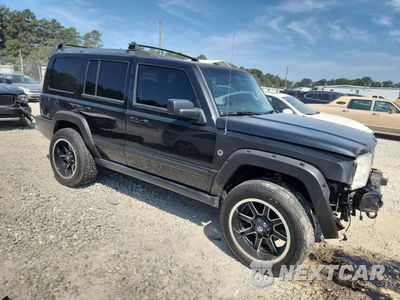 Czwarte zdjęcie samochodu z boku: 2010 JEEP COMMANDER LIMITED VIN:1J4RG5GT1AC153187 - miniatura