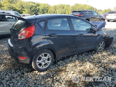 Trzecie zdjęcie samochodu z tyłu: 2015 FORD FIESTA SE VIN:3FADP4EJ6FM132360 - miniatura