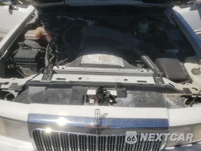 Zdjęcie 11 z 12 samochodu: 1994 LINCOLN TOWN CAR EXECUTIVE VIN:1LNLM81W2RY774196 - miniatura