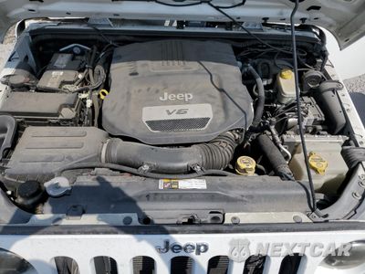 Zdjęcie 12 z 13 samochodu: 2014 JEEP WRANGLER UNLIMITED SPORT VIN:1C4BJWDG5EL304298 - miniatura