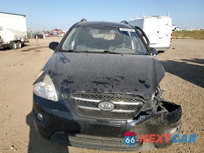 Piąte zdjęcie samochodu w środku: 2009 KIA RONDO LX VIN:KNAFG526797258344 - miniatura