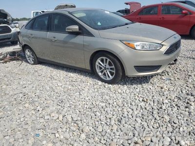 Czwarte zdjęcie samochodu z boku: 2016 FORD FOCUS SE VIN:1FADP3F2XGL401819 - miniatura