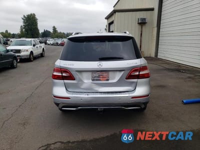 Zdjęcie 6 z 12 samochodu: 2013 MERCEDES-BENZ ML 350 BLUETEC VIN:4JGDA2EB1DA157214 - miniatura
