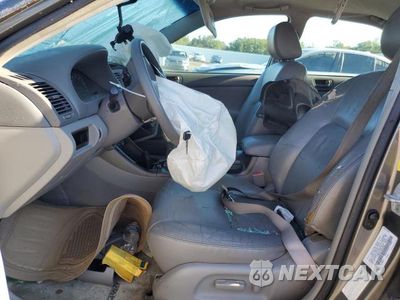 Zdjęcie 7 z 12 samochodu: 2002 TOYOTA CAMRY LE VIN:4T1BE32K12U555069 - miniatura