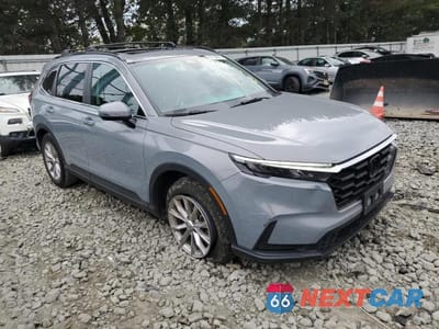 Czwarte zdjęcie samochodu z boku: 2023 HONDA CR-V EXL VIN:2HKRS4H79PH431038 - miniatura
