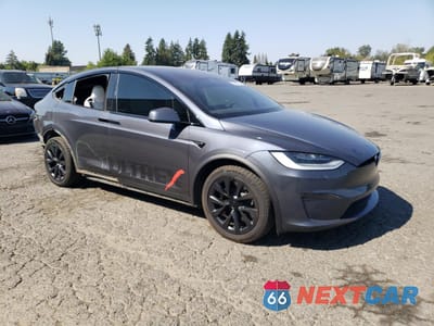 Czwarte zdjęcie samochodu z boku: 2022 TESLA MODEL X VIN:7SAXCBE55NF335370 - miniatura