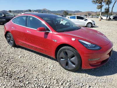 Czwarte zdjęcie samochodu z boku: 2018 TESLA MODEL 3 VIN:5YJ3E1EA7JF058132 - miniatura