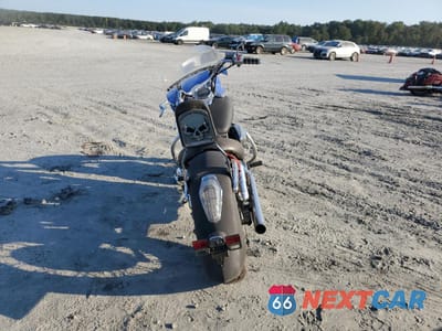 Czwarte zdjęcie samochodu z boku: 2004 HONDA VT750 C VIN:JH2RC50004M000209 - miniatura