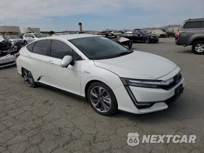 Czwarte zdjęcie samochodu z boku: 2021 HONDA CLARITY VIN:JHMZC5F15MC001398 - miniatura