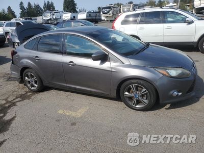 Czwarte zdjęcie samochodu z boku: 2012 FORD FOCUS SE VIN:1FAHP3F22CL140102 - miniatura