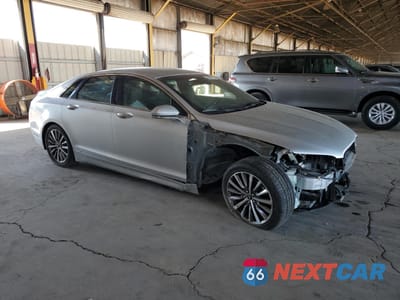 Czwarte zdjęcie samochodu z boku: 2019 LINCOLN MKZ VIN:3LN6L5A97KR617633 - miniatura