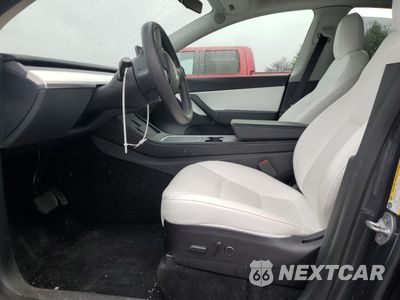 Zdjęcie 7 z 13 samochodu: 2022 TESLA MODEL Y VIN:7SAYGDEE8NF417629 - miniatura